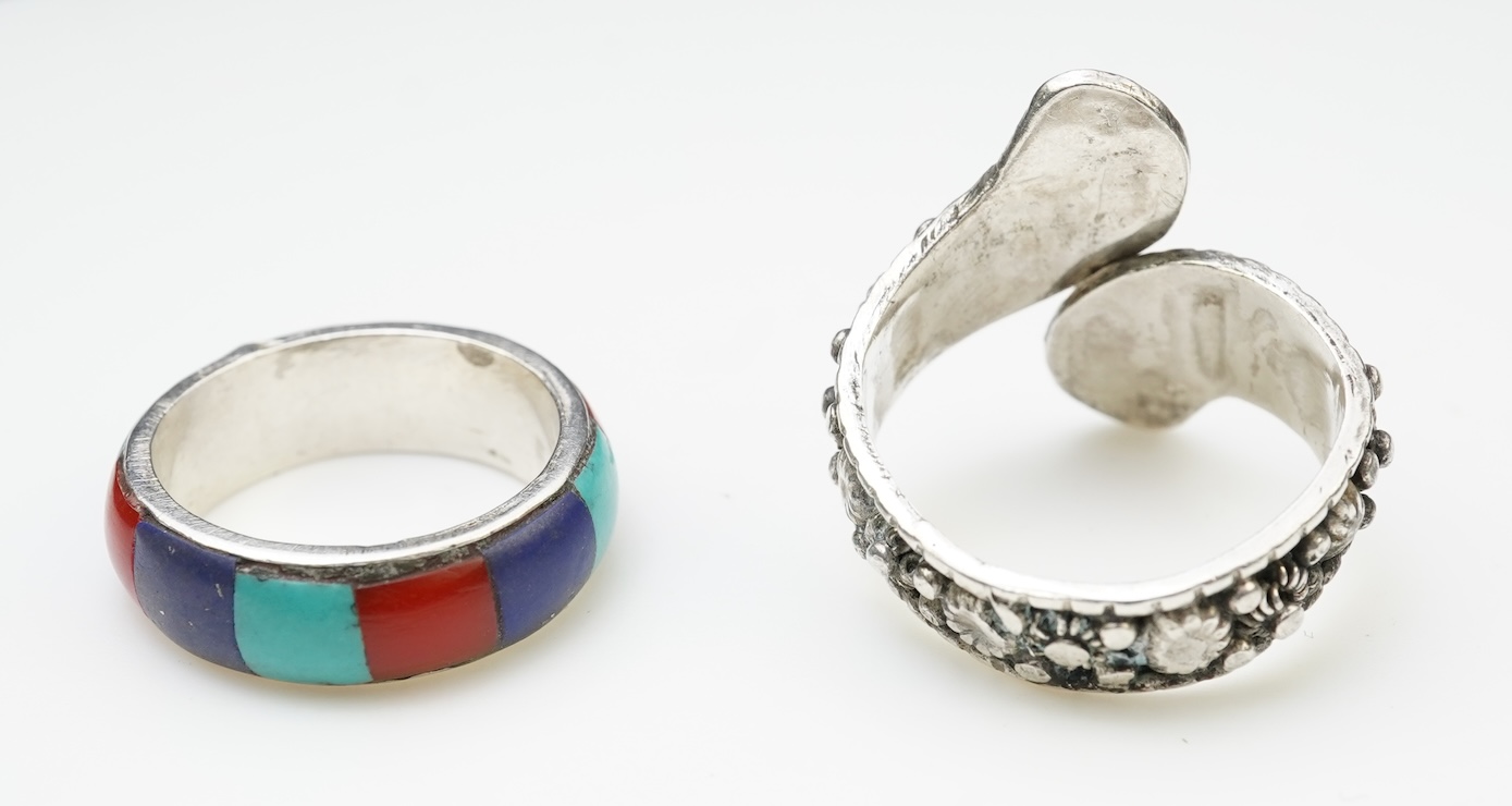 A collection of silver jewellery including a Zuni bangle